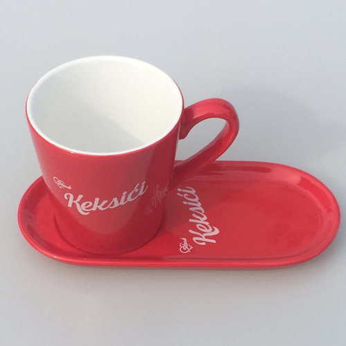 red cup and saucer