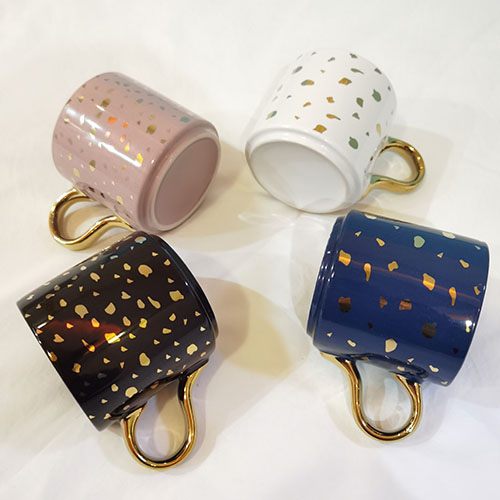 color glaze mug with gold decorations